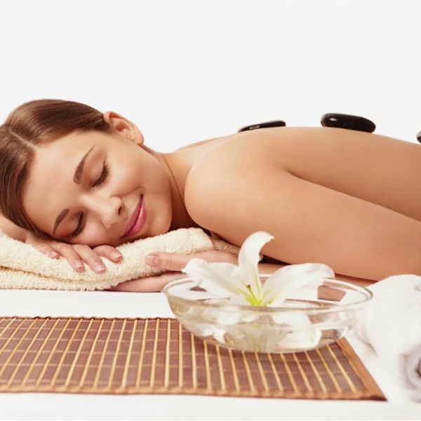 Masaje Descontracturante con piedras calientes